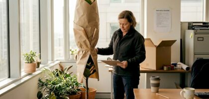Manager prepares plants for office relocation