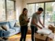 Couple unpacking boxes in Melbourne apartment