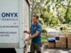 Person closing rental moving truck in Melbourne