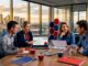 Team planning office relocation in conference room