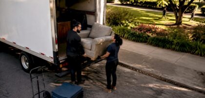 Labour-only movers loading furniture into rental truck