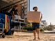 Two movers loading truck at suburban home Australian style