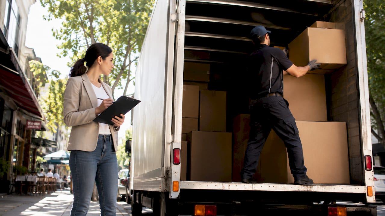 Woman managing shared truck moving in Melbourne