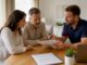 Couple reviewing fixed price moving contract