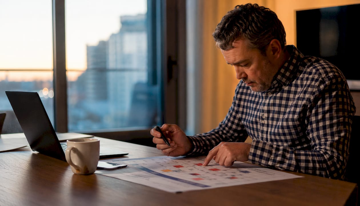 Man reviewing calendar with removalist pricing