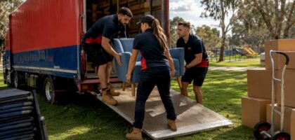 Removal team loading moving truck outdoors in Melbourne