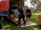 Removal team loading moving truck outdoors in Melbourne