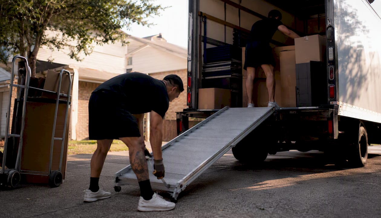 Moving truck and movers arranging equipment