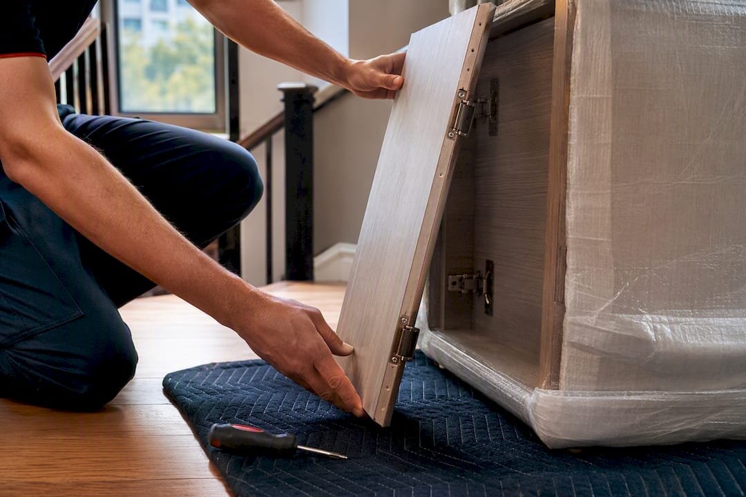 Mover removing door for furniture access