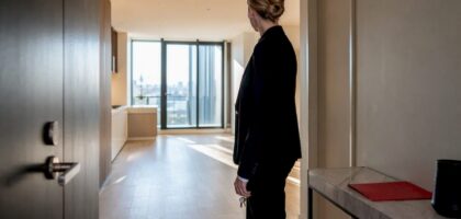 Relocation manager inspecting Melbourne apartment