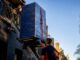 Wrapped furniture lifted beside Melbourne terrace