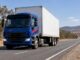 Loaded removal truck travelling along an Australian highway